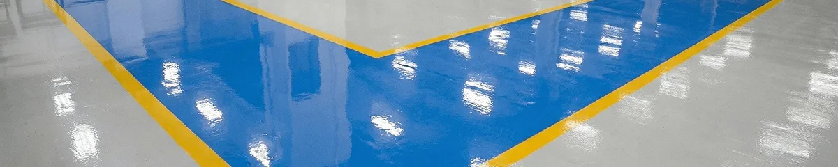 A factory floor professionally covered and marked with epoxy flooring in Chattanooga, TN